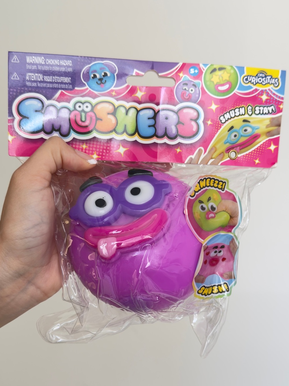 Authentic ORB Smushers Purple Squishy Stress Toy - Playful Face Stress Plush